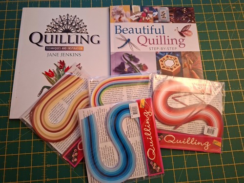 Quilling books and papers - and,