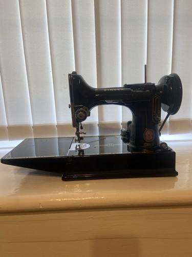 Singer sewing 221k with case - ,