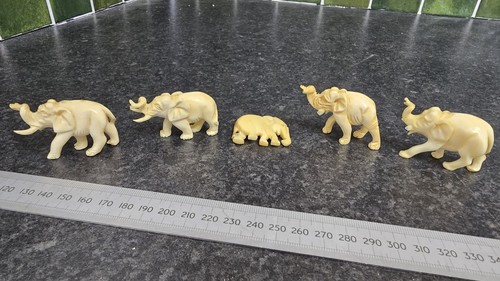 Old carved elephant figures - old,
