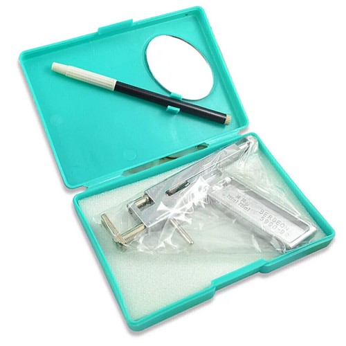 Professional ear piercing gun - ear,