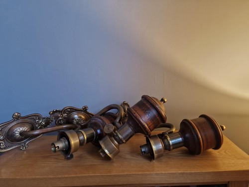 Three electric wall sconces