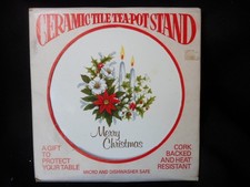 VINTAGE MERRY CHRISTMAS TEAPOT STAND IN PACKAGING