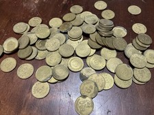 100 X 5p TOKENS ASSORTED BRASS