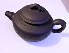 Vintage Chinese purple clay teapot with strainer