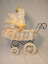 Vintage Minature Dolls pram. Wood dressed  with Lace.  Hand made.  Decorative.