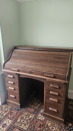 Antique wooden roll top desk