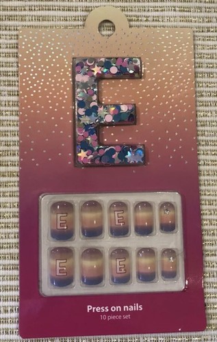 Alphabet press nails - on,