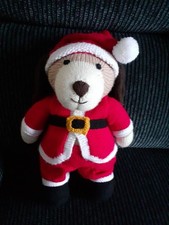 hand knitted santa dog with