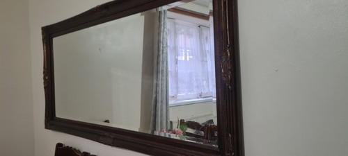 Large ornate wooden mirror