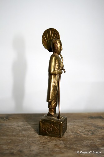 Buddhist brass monk holding - buddhist,