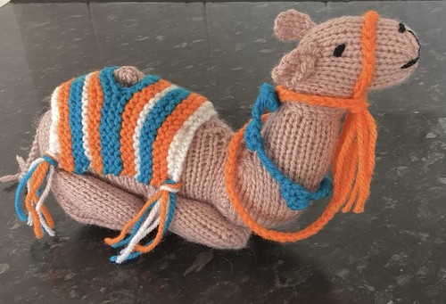 Hand knitted camel christmas - hand,
