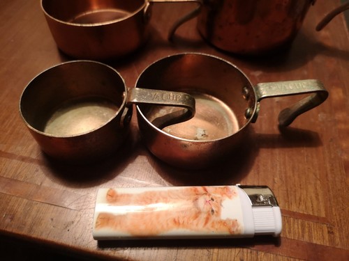 Vintage cup measuring copper