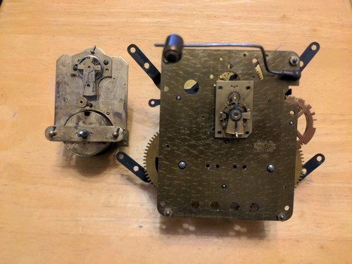 Two clock movements and - clock, a