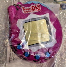 Tamagotchi Brand new Unopened PINK on a keyring