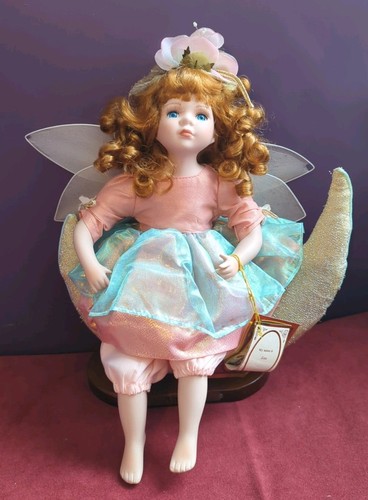 Porcelain doll girl sitting - porcelain,