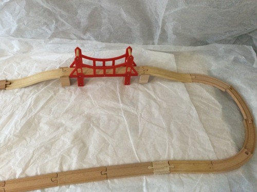 Wooden train track red bridge - train,