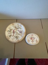 ANTIQUE CERAMIC CAKE PLATE AND A TEAPOT STAND HAND PAINTED