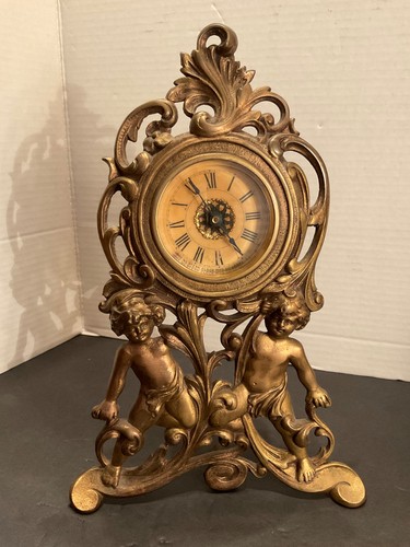 Antique working cherub alarm - antique,