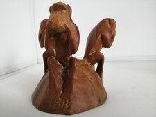 Three wooden hand-carved wise