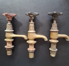 Three Vintage Brass Basin Taps