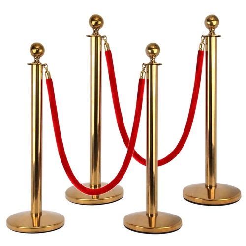 Gold stanchion barrier posts - barrier,