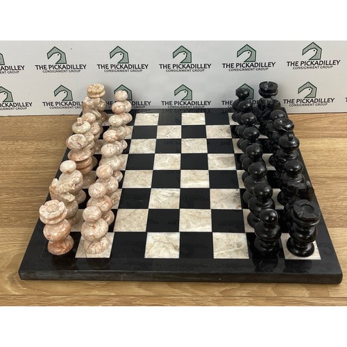 Hand carved marble chess - hand,