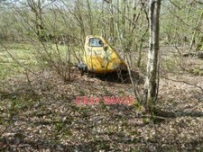 PHOTO  ABANDONED RELIANT ANT IN THE CORNER OF QUARRY WOOD IS THIS THREE WHEELED