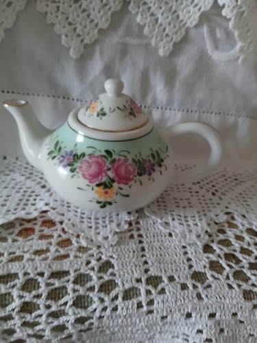 Miniature teapot please - , see