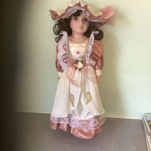 Porcelain girl doll dark brown - girl,
