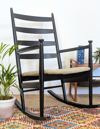 Danish rocking chair mid - rocking,