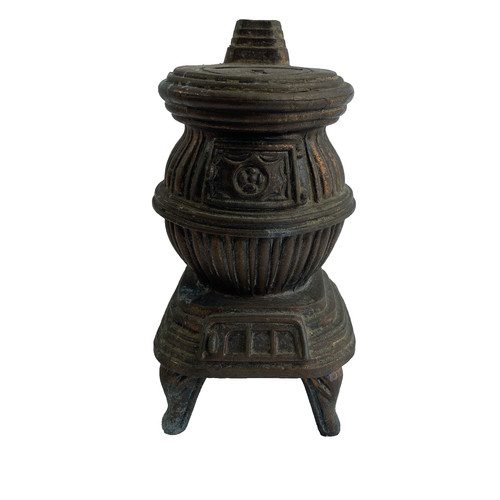 Old bronze pot bellied - bellied, stove
