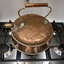 large antique copper kettle With Brass and Copper Handle . Has a Brass Spout