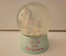 Cute unicorn snow globe