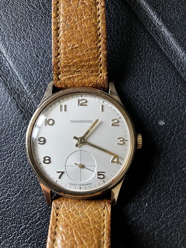 Solid gold garrard gents - 9k,