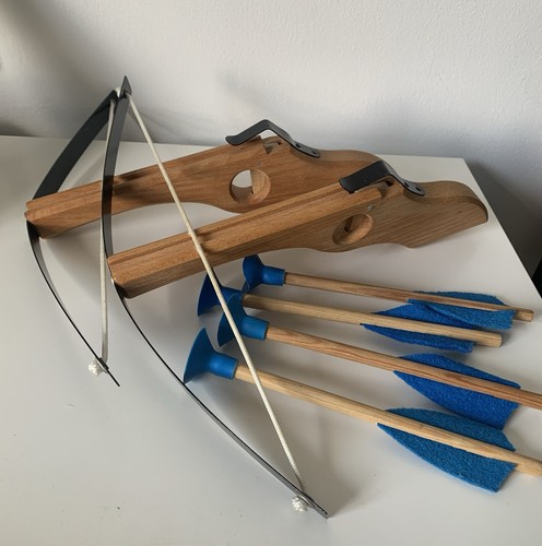 Two toy wooden crossbows with - two,