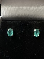 Oval natural emerald stud earrings