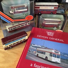 5 Devon General buses and book
