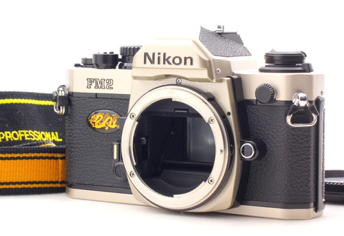 Top mint nikon - mint], year