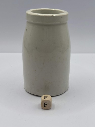 Old white stoneware jar