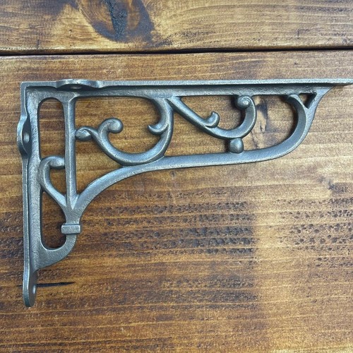 Cast iron shelf brackets - iron,