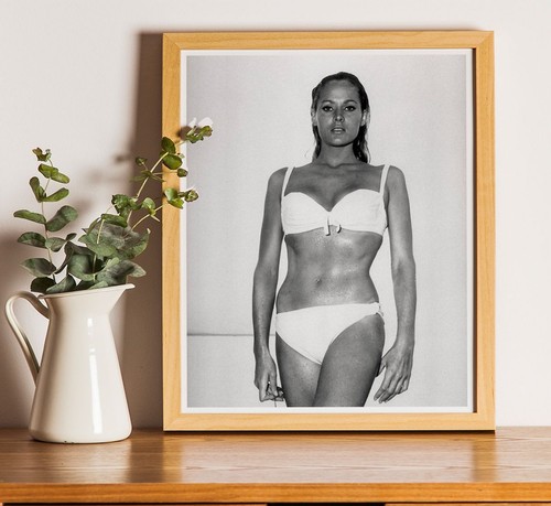 Ursula andress holding flower - holding,
