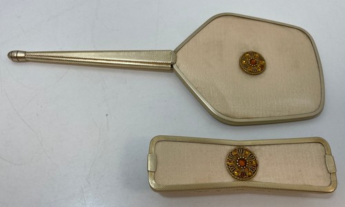 Hand mirror and brush - hand,