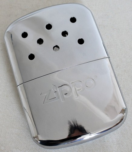Handwarmer zippo including - handwarmer,