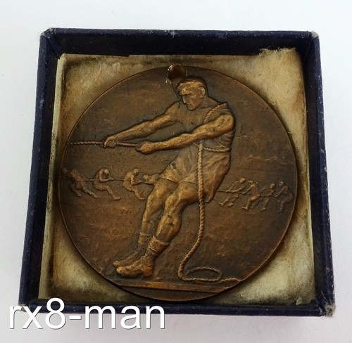 Antique 1923 bronze tug war - antique,