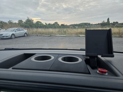 Dual cup phone holder - &,