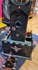 Wooden toy castle with accessories