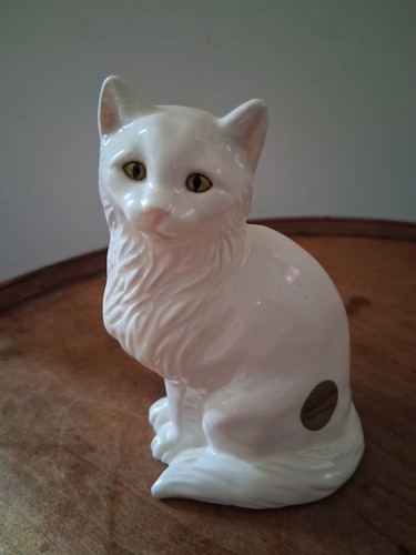 Seated white cat john - seated,