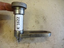 Dividing head indexing arm