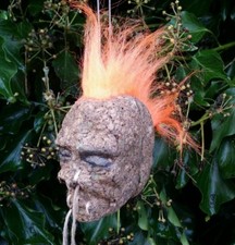 ORANGE MOHAWK SHRUNKEN HEAD