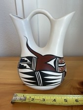 K.T SIGNED ACOMA DECORATED